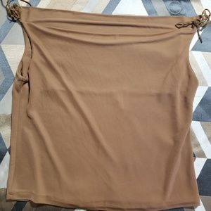 A TOTO brand tan sleeveless blouse